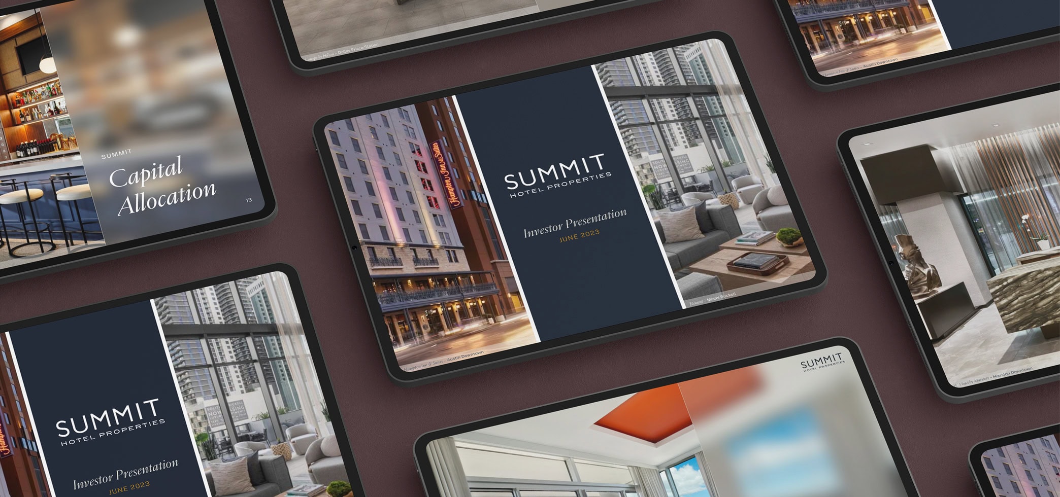 Tablets showing real estate investor presentations.